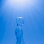 clear mannequin on blue background